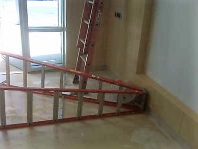Two Step Ladders, One Has Fallen