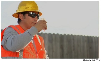 Construction Worker Taking a Break to Drink Water