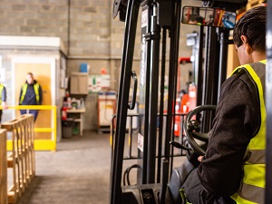 Forklift Driver, Two Workers in Safe Area Away from Forklift
