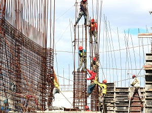 Workers on Construction Site Working at Heights