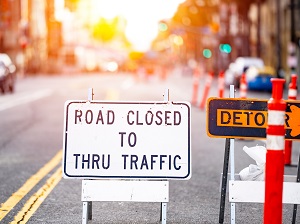 Road Closed to Thru Traffic and Detour Sign