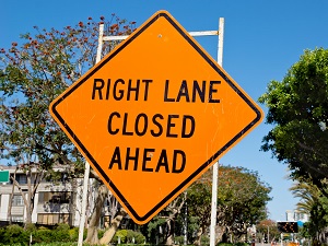 Right Lane Closed Ahead Warning Sign on Roadway