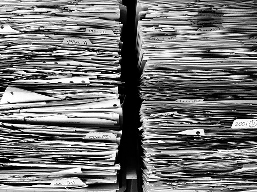 Papers Crammed Into File Folders