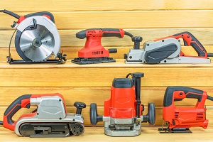 Assorted electrical tools on shelves.