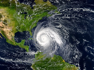 Aerial view of Earth showing a hurricane moving towards the United States.