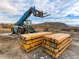 Large forklift at a construction site.