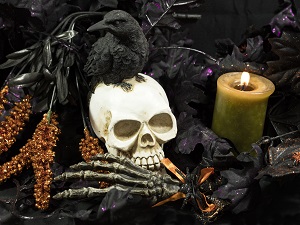 Halloween decorations including a lit candle which can be dangerous.