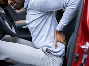 A driver with an aching back.