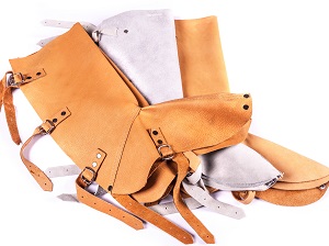 Leather covers that will go over shins and boots for protection.