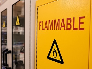 Flammable materials cabinet in a workplace.