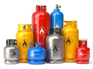 An assortment of different sized propane tanks.