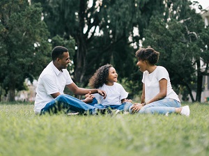 A family spending time together outdoors.