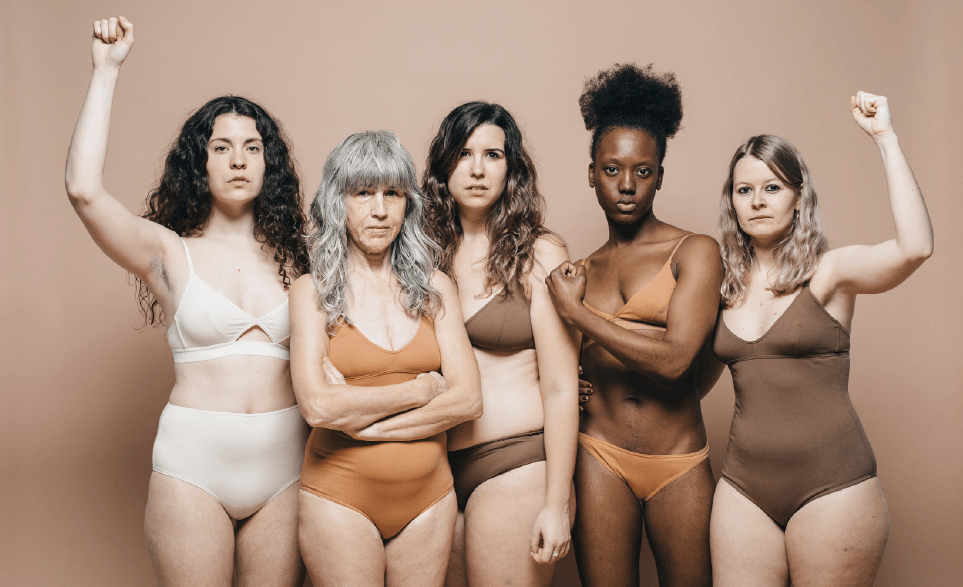 Five confident healthy women in underwear