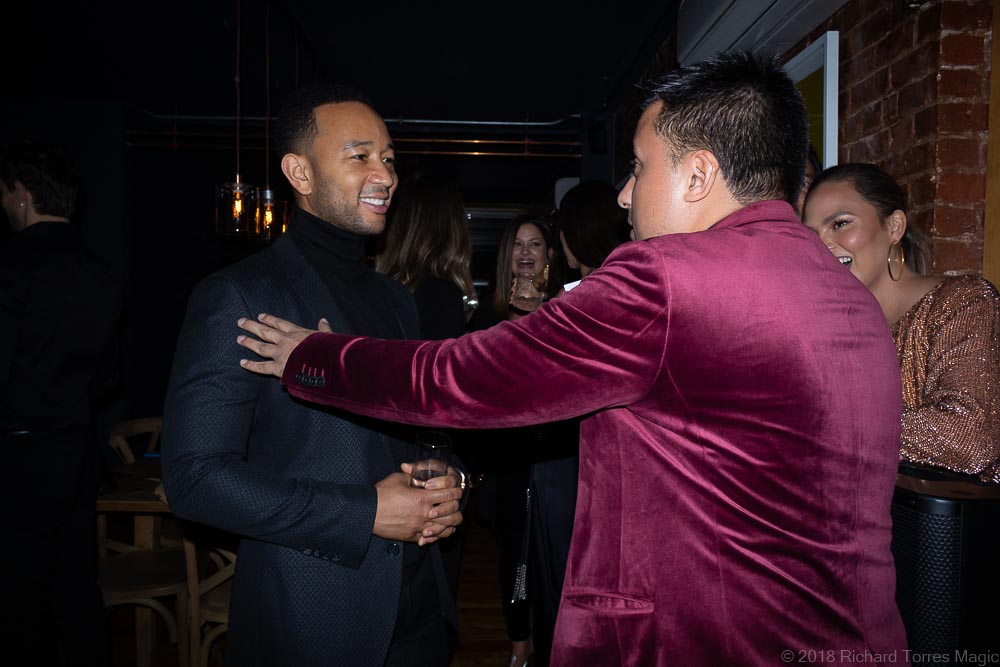 actor magician Richard Torres with singer John Legend and Chrissy Teigen