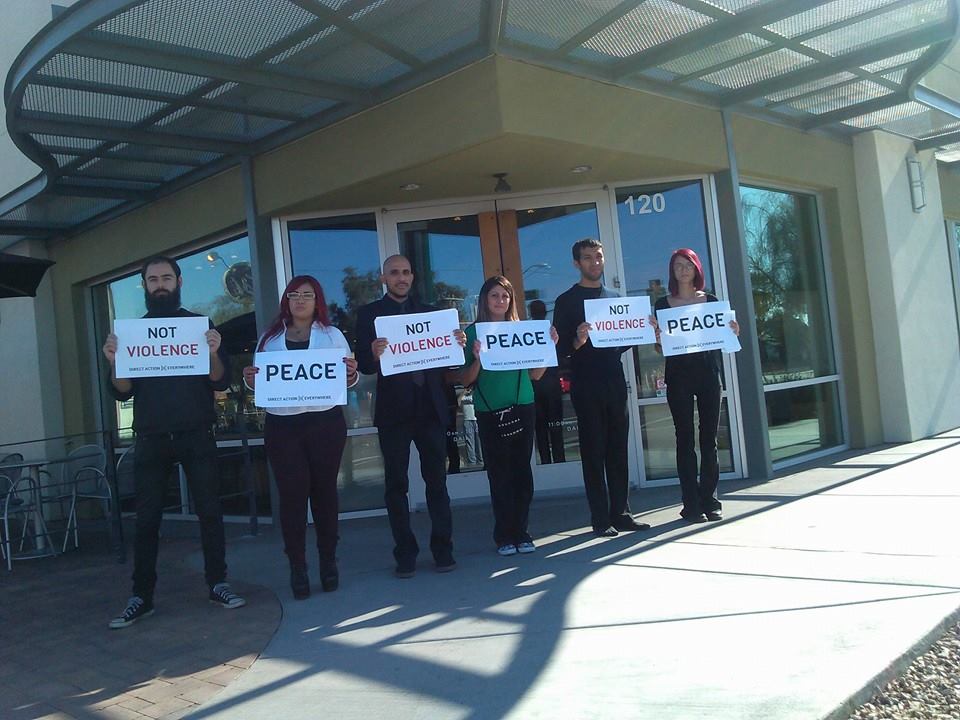 Mathias (on the far left) with DxE in Phoenix, protesting Chipotle.