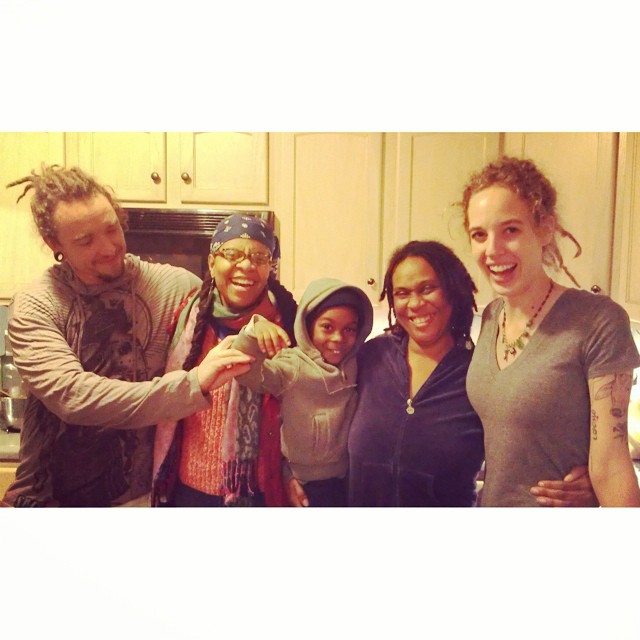Interviewer Natalie Blanton (far right), her partner Harold (far left) and the Solfood Catering team (center).
