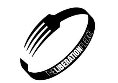 The Liberation Pledge icon, a fork bent into a circle, inscribed with the words The Liberation Pledge.