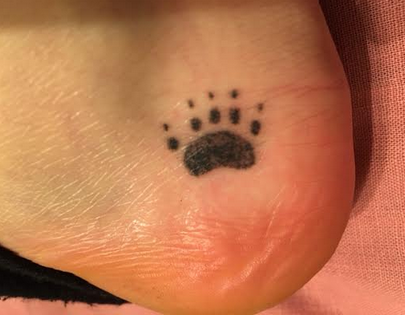 I gave myself a stick-and-poke tattoo of a skunk paw print in his honor.