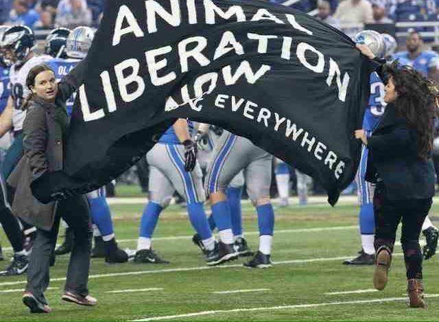 Eva and fellow activist Araceli Rodriguez run onto the field at the National Football League's famous