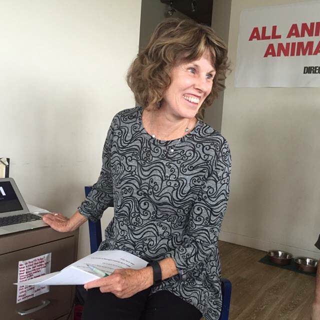 Leslie giving a presentation about her art