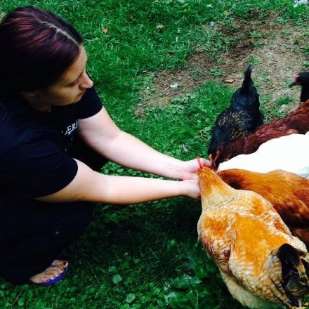 Rachel hanging out with the residents, enjoying a snack