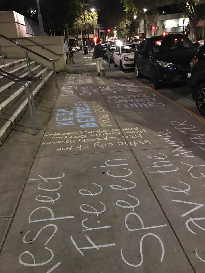 Chalk outside Berkeley City Hall Wednesday night.