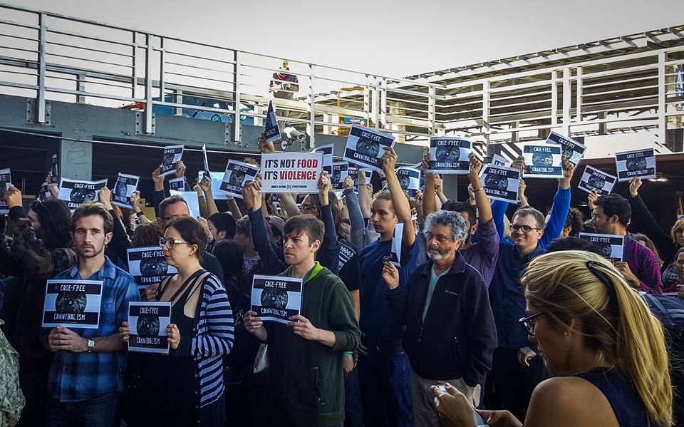 DxE activists protest outside Costco in San Francisco.