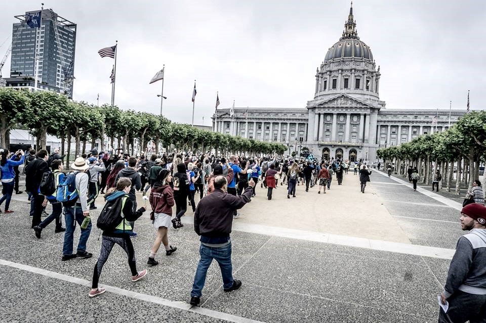 Activists march to City Hall