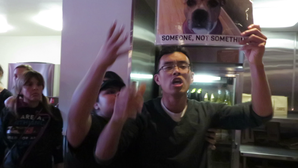 Multiple Chipotle employees grabbed our protesters and attempted to pull them out of the restaurant.
