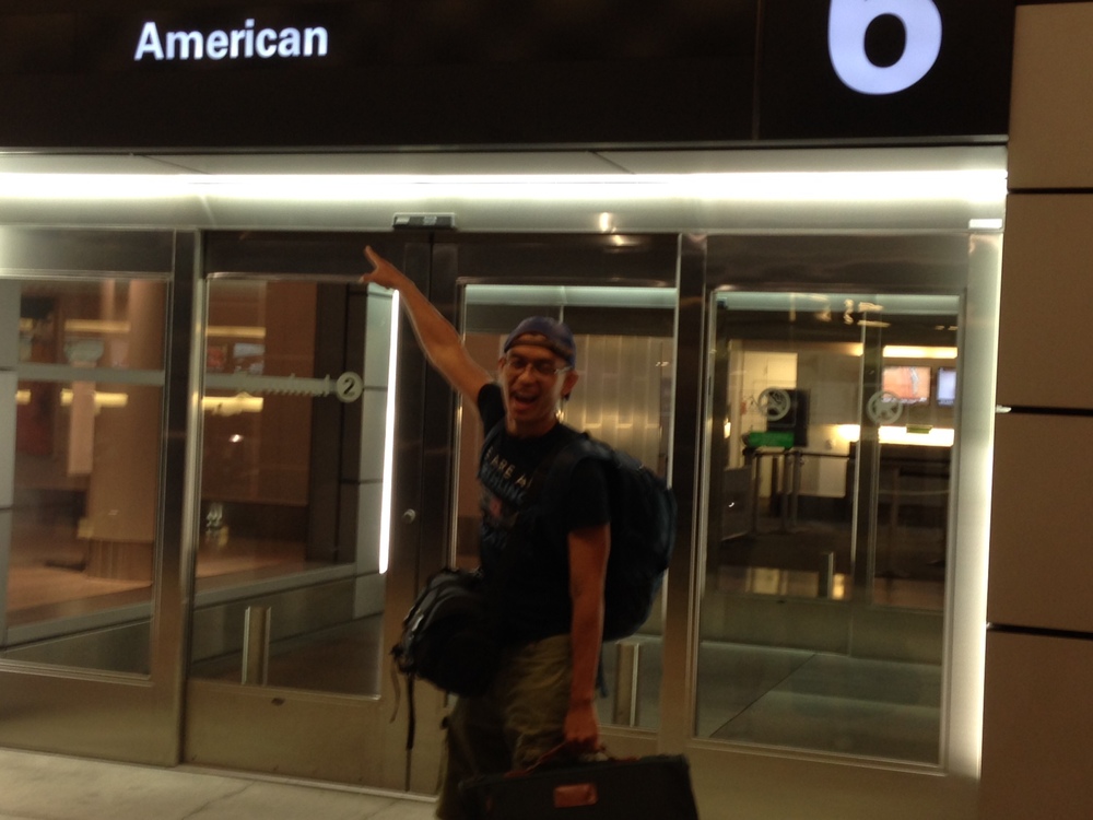 My skin may be brown, but I'm still American. The sign says so!