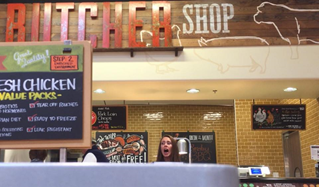 Julianne Perry disrupts a butcher counter.