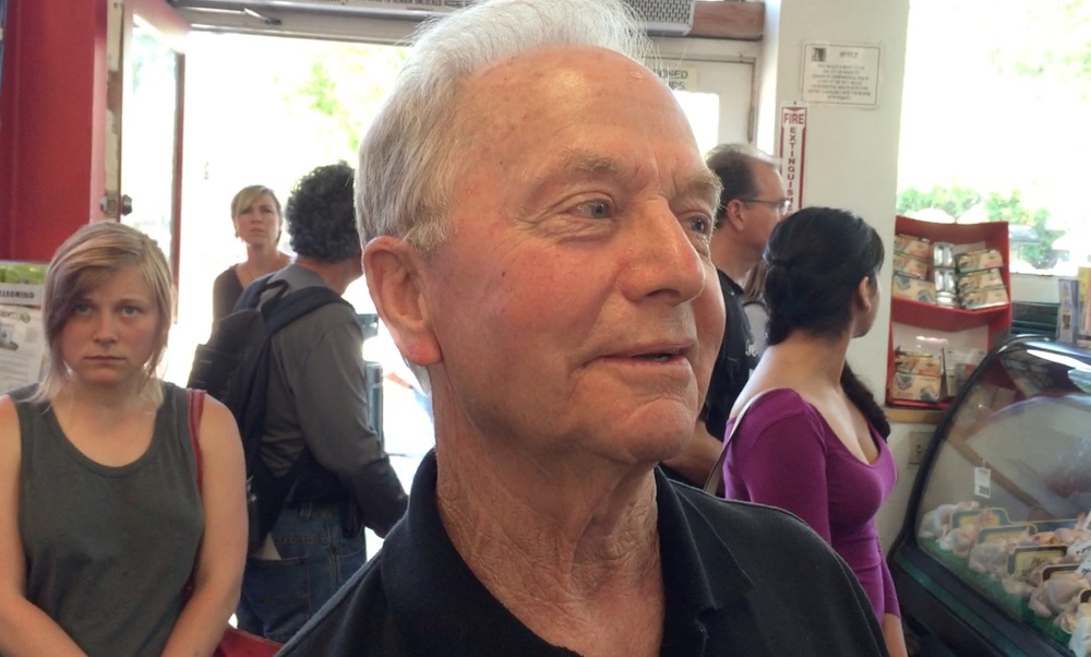 Paul Willis during Q&A in butcher shop with DxE activists.