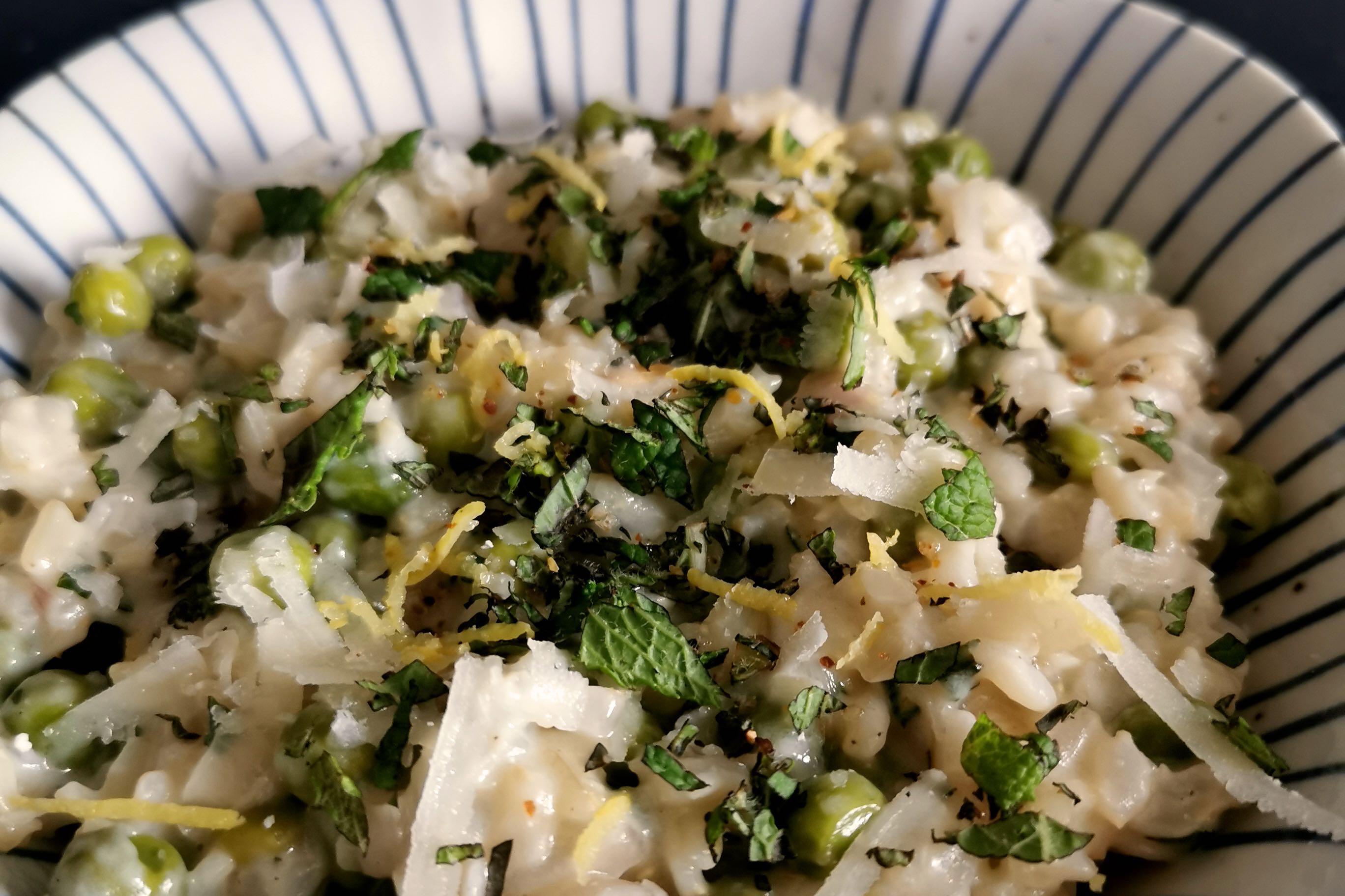 Leftover rice with peas, goat cheese and mint