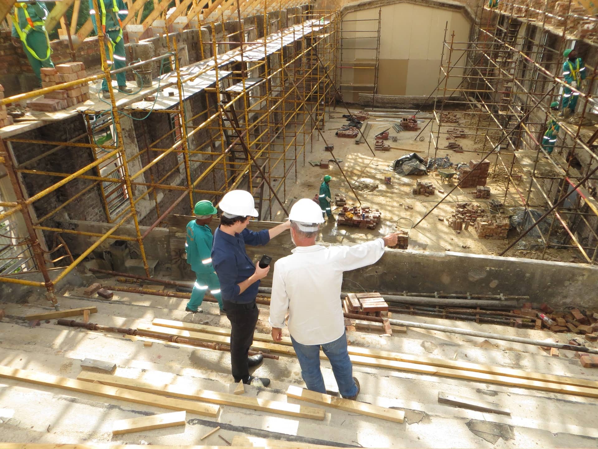 How can construction companies become more sustainable