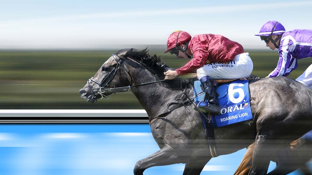 A horse racing for the finish line at Sandown Park