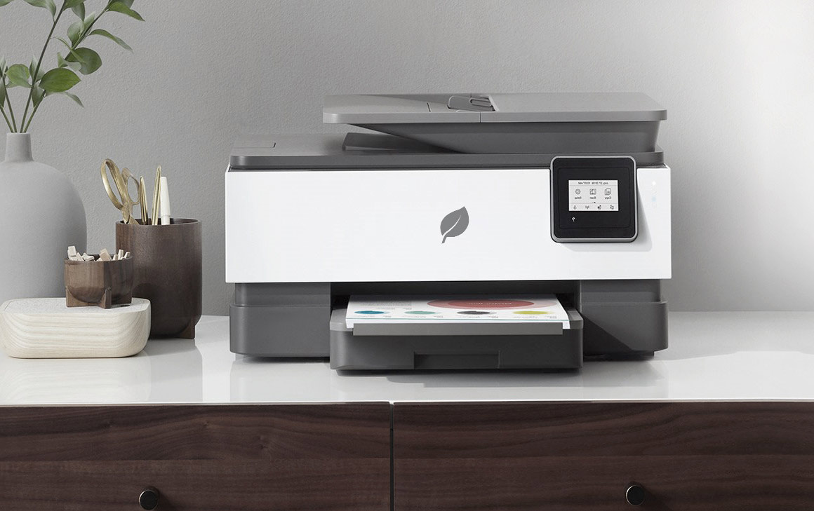 A printer on a stylish home office console.