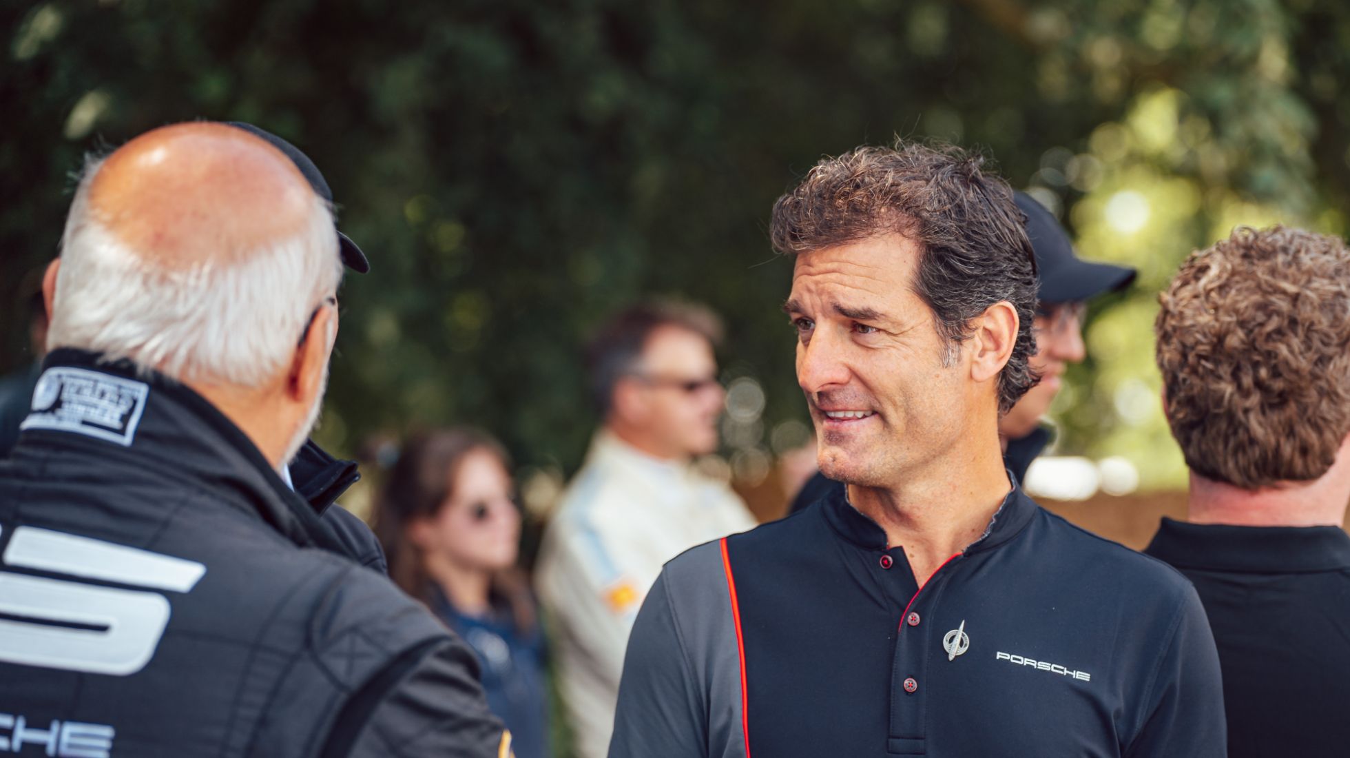 Just Mark Webber having a laugh with Olaf Manthey. A normal Goodwood thing