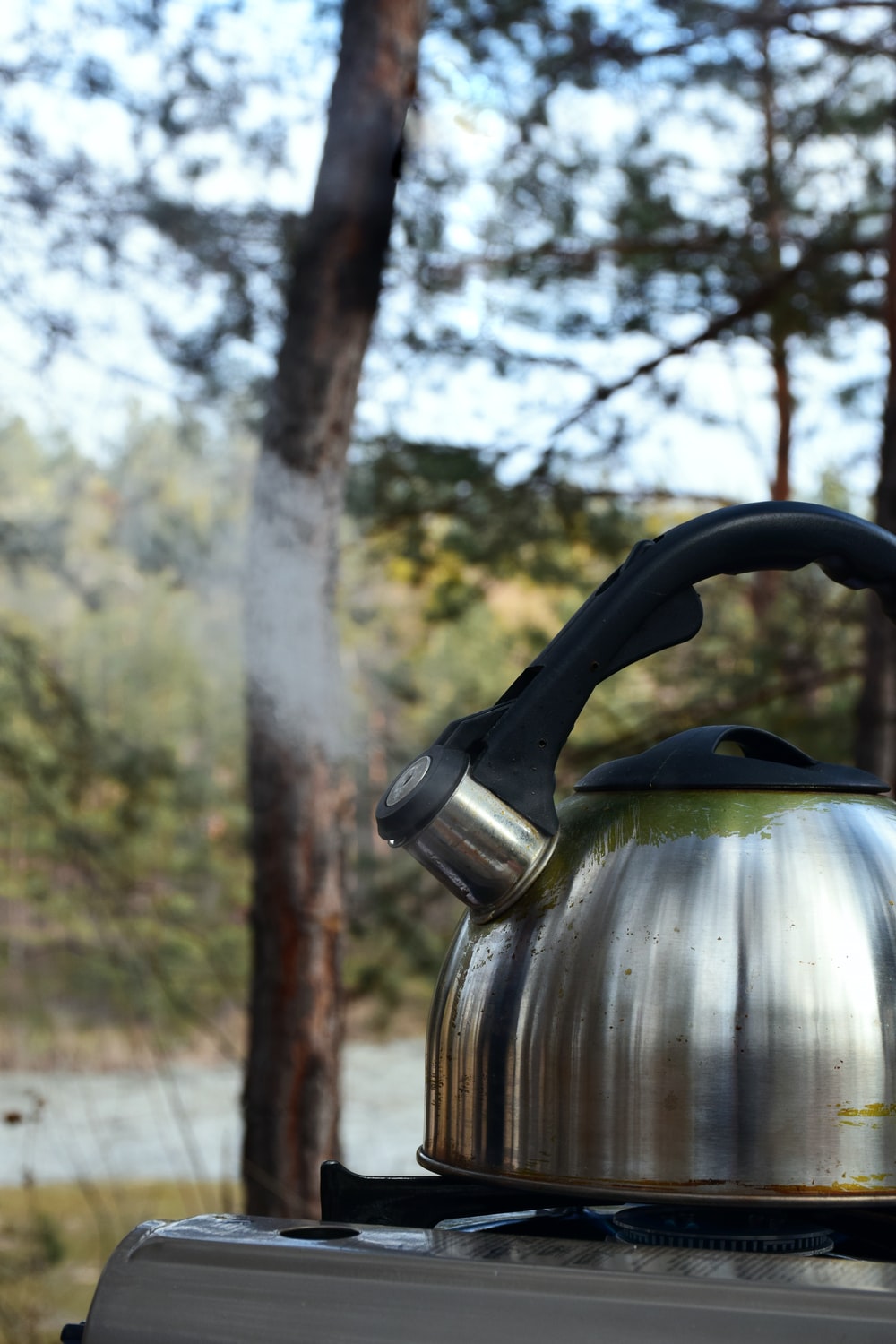 Boiling water in camping kettle