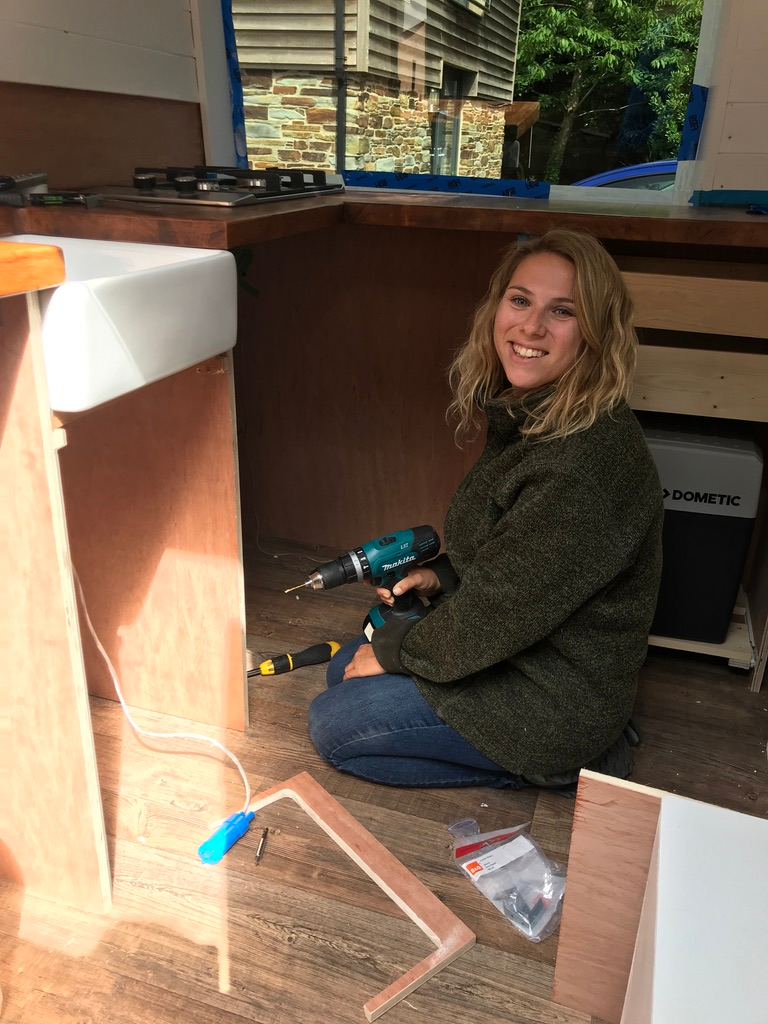 Fitting solar panels and solar batteries campervan