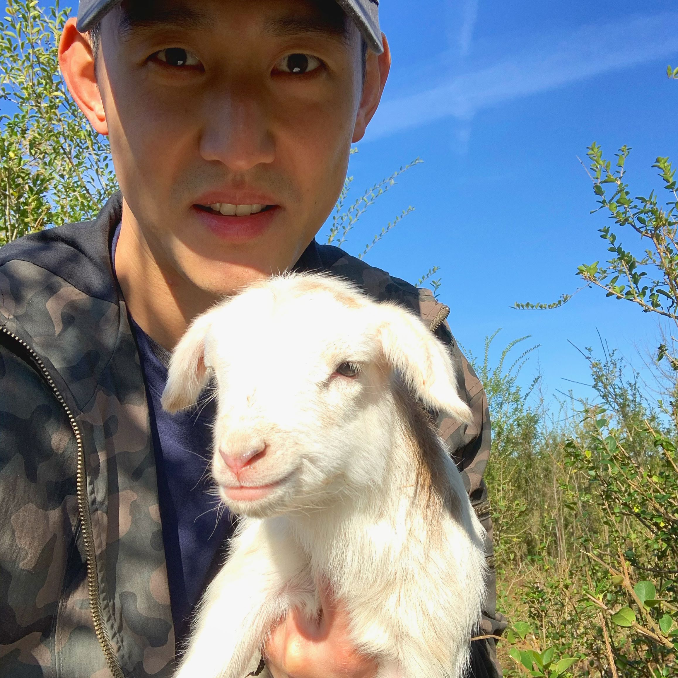 Future farmer holding a lamb