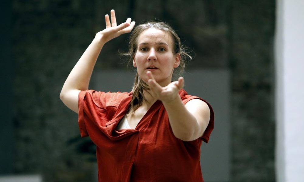 Anna Kempin captured performing at Atlas 2 contemporary dance project, moving with her hands