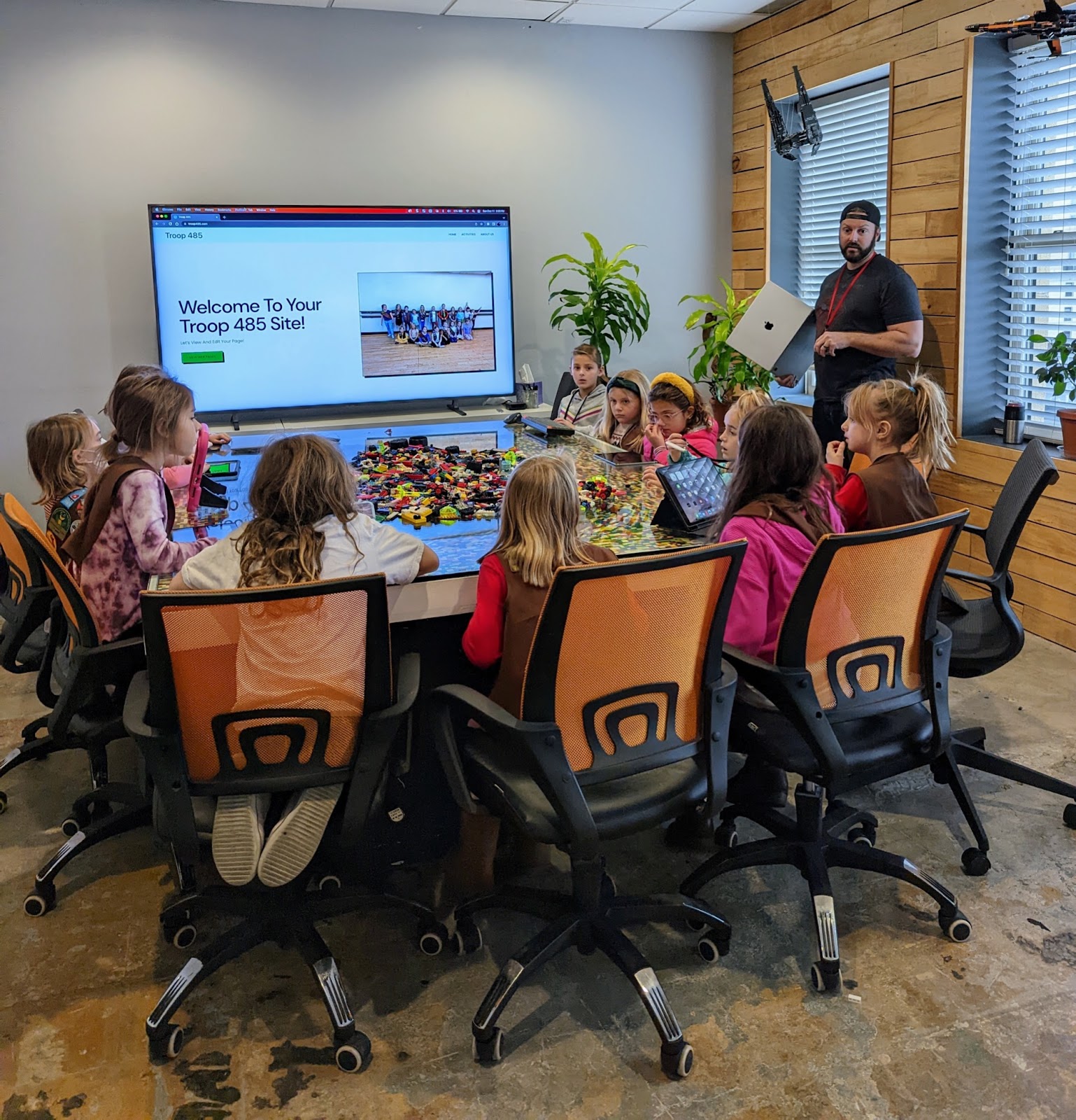Girl Scouts learning about computer engineering, web design and development.