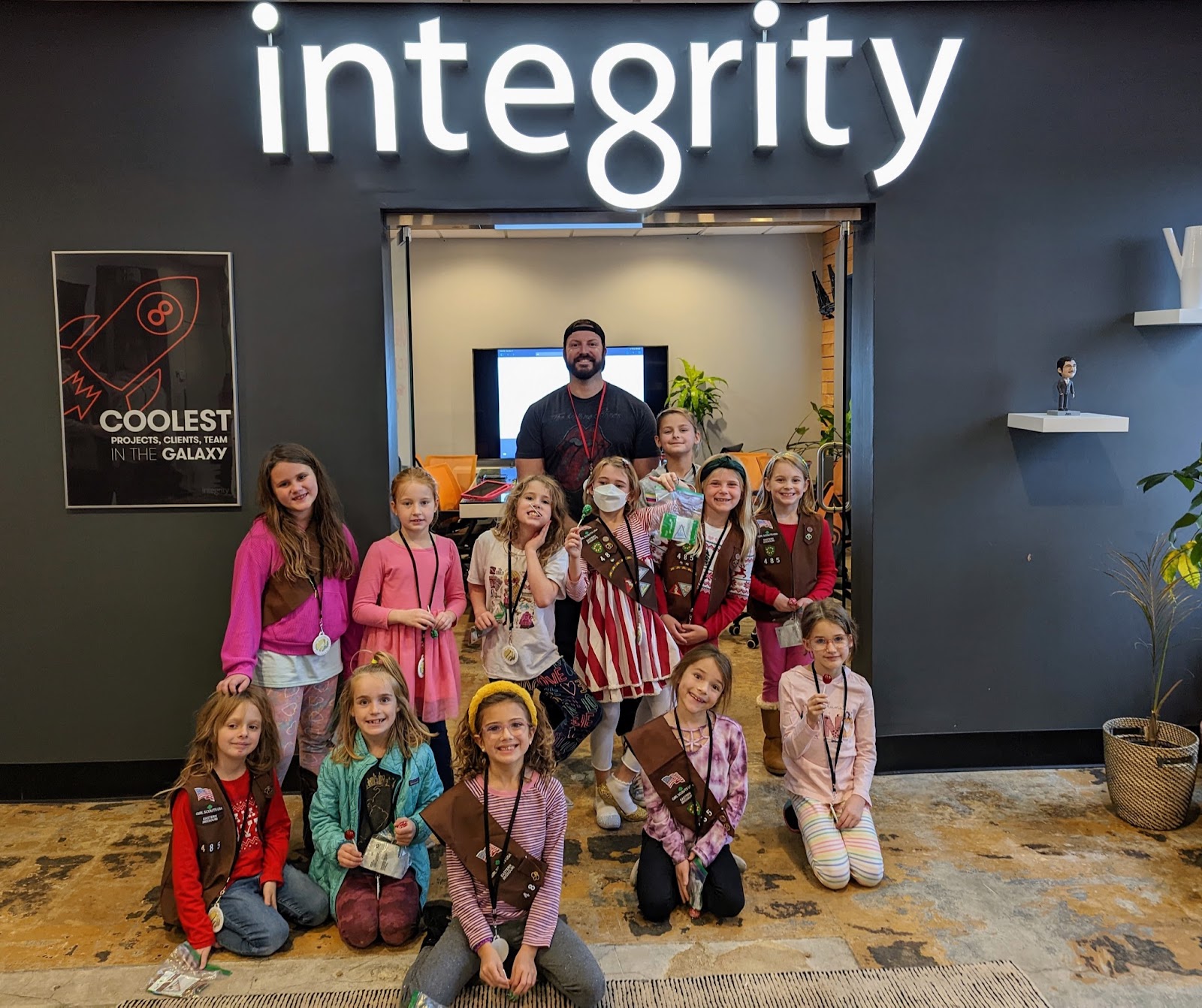 Integrity developer Jonathan Domian and the Girl Scouts in the STL Integrity offices.
