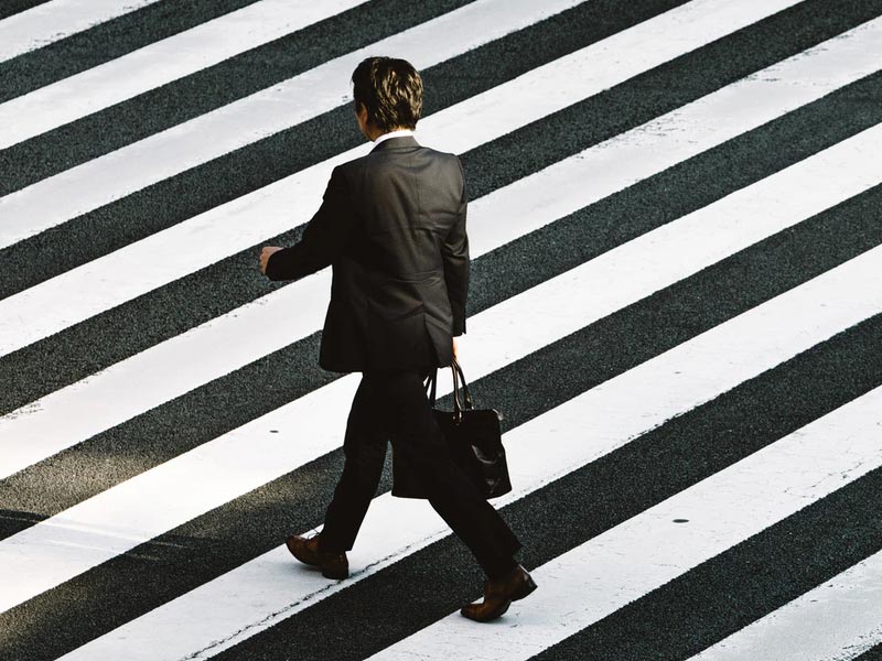 A man crossing the road.