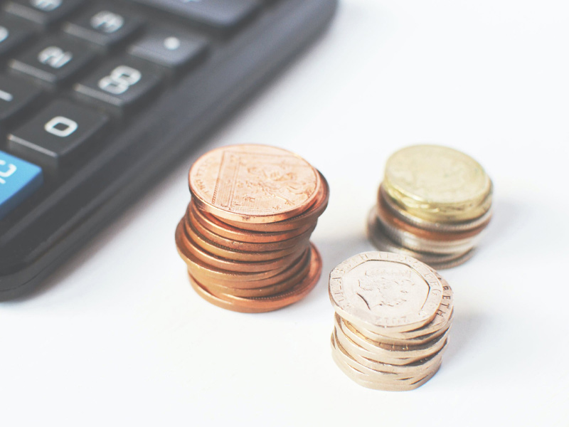 Coins and a calculator.
