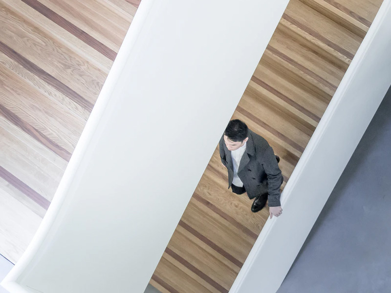 Man walking down the stairs.