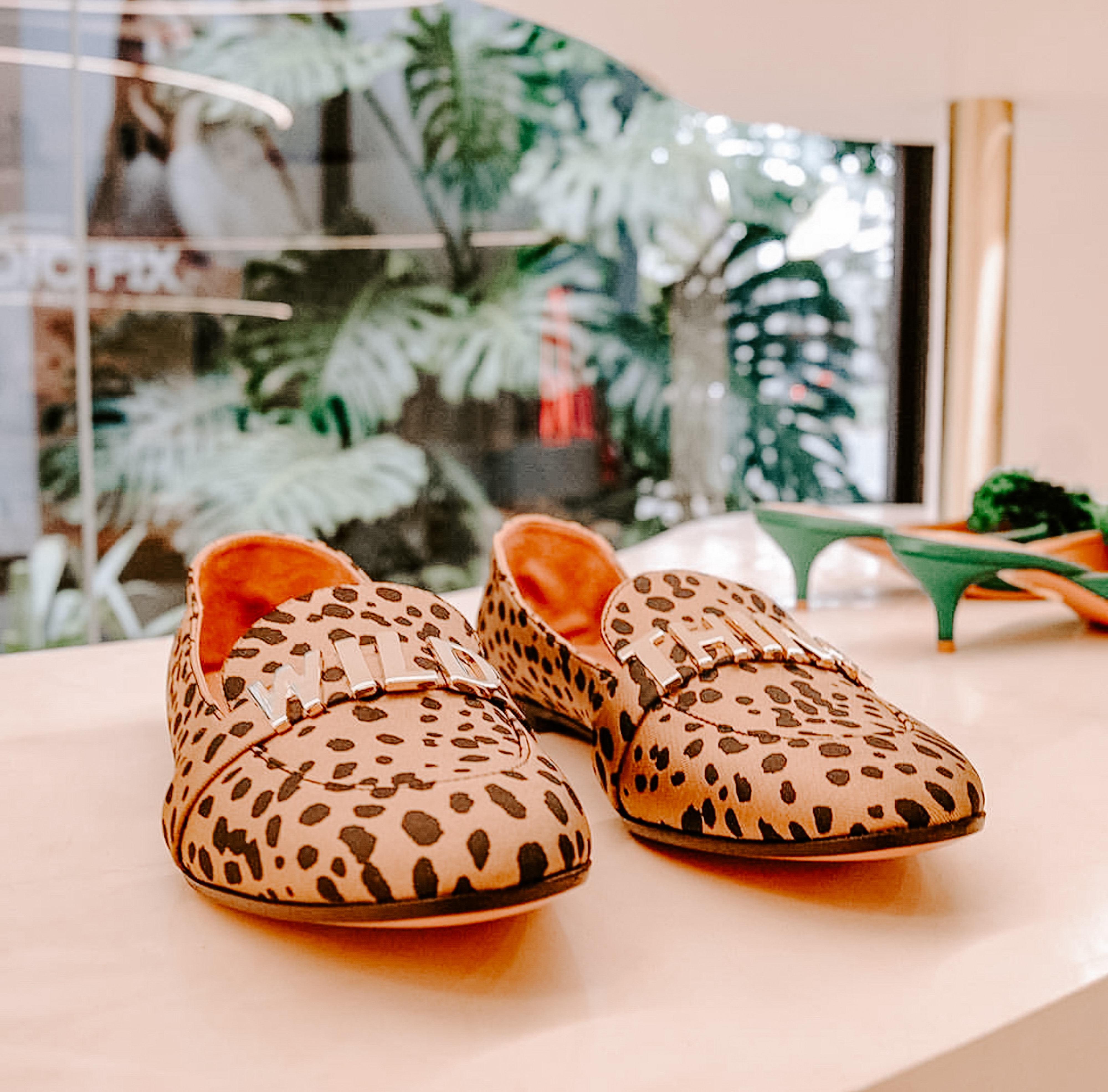 Leopard loafers on display in a store