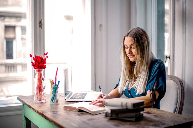 woman working from home in organized office