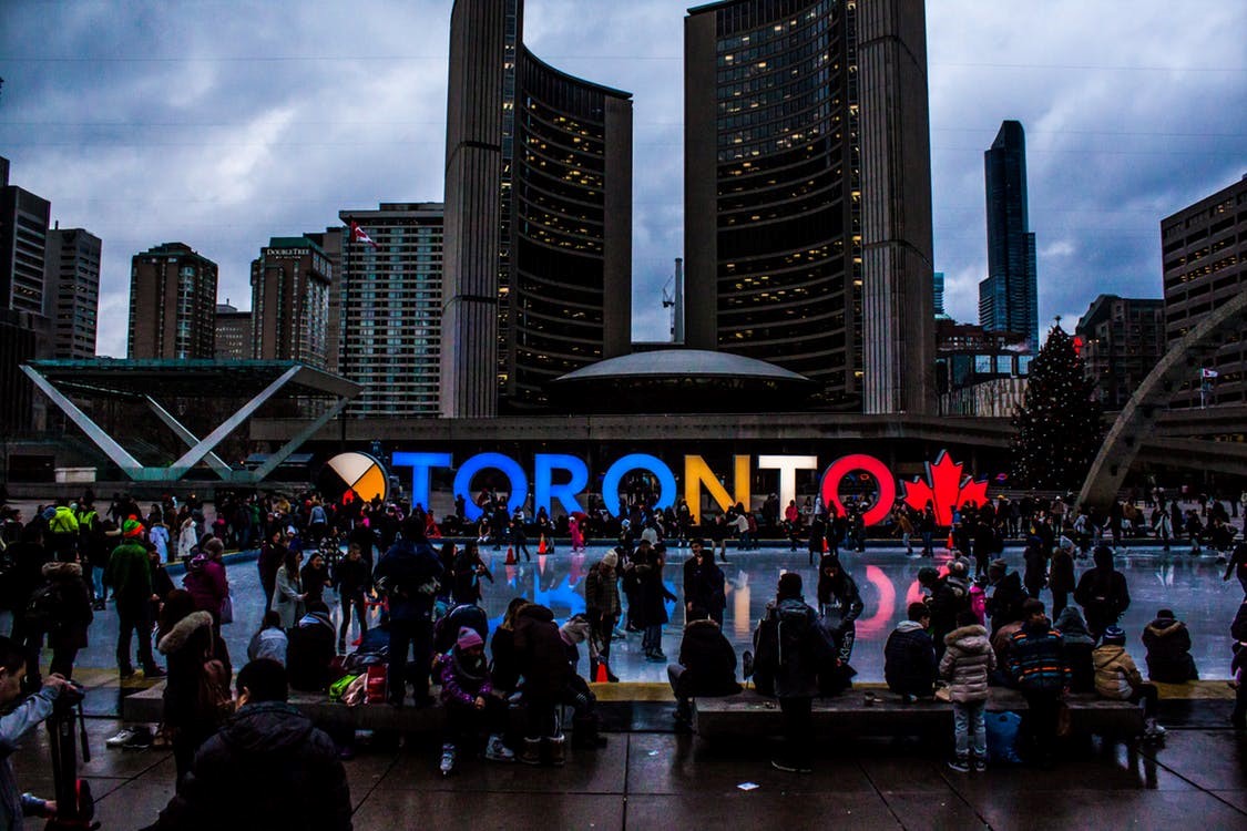 People skating on rink in downtown toronto
