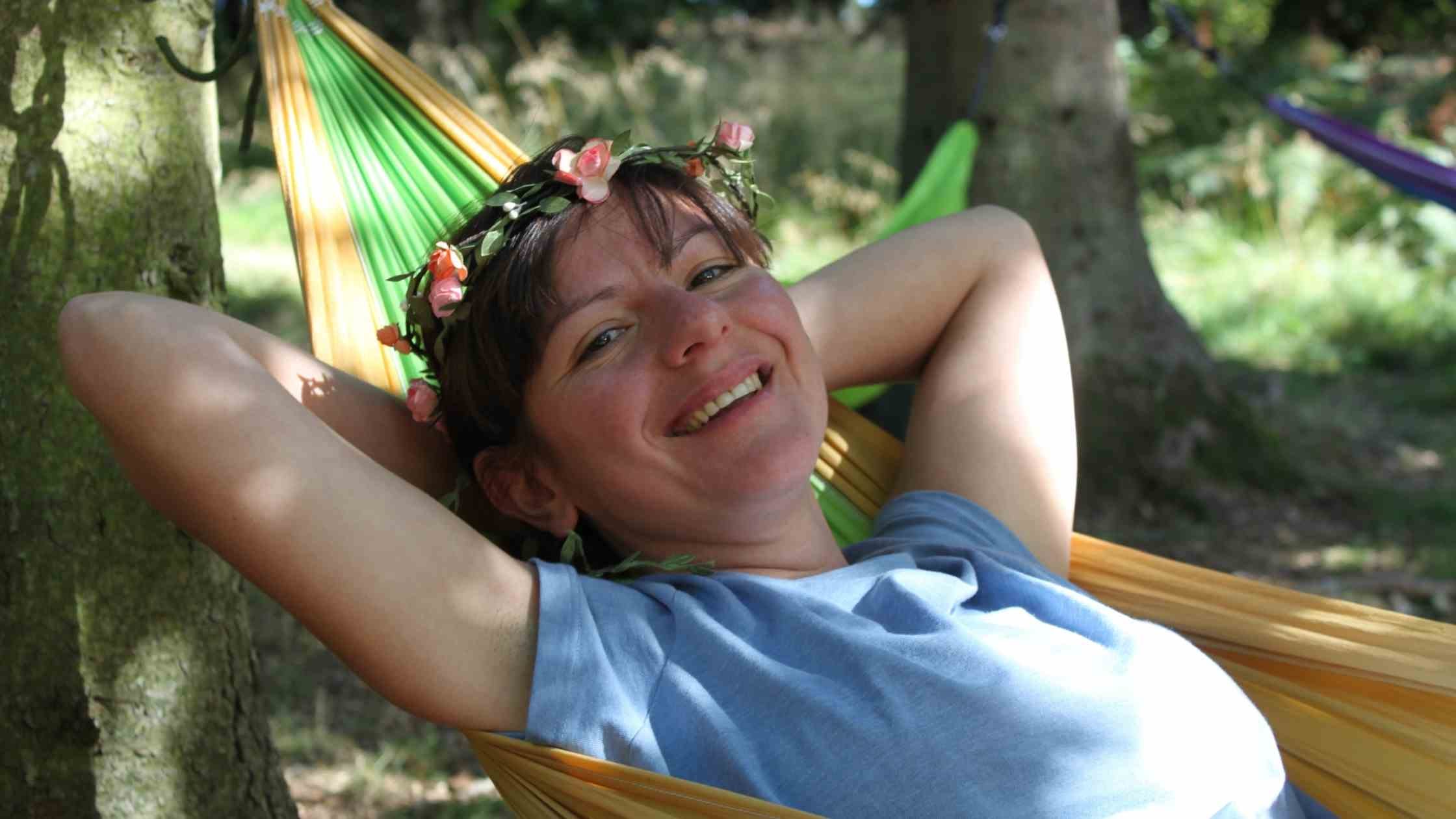 Woman with flower Crown in a Hammock